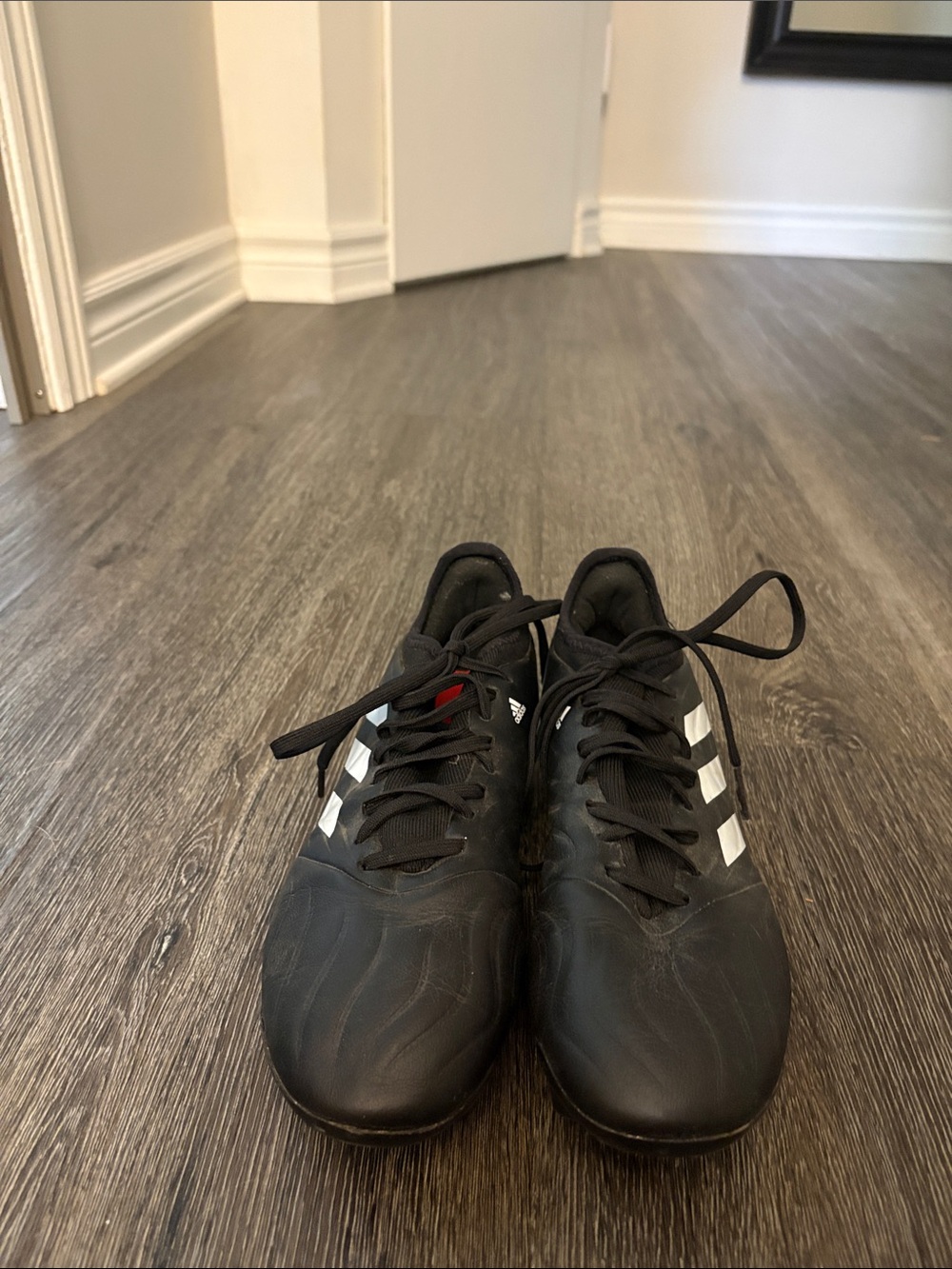 adidas Women's Black Athletic Shoes with White Stripes